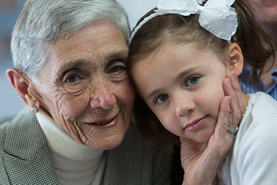 Photo of a woman and childing smiling contact.jpg